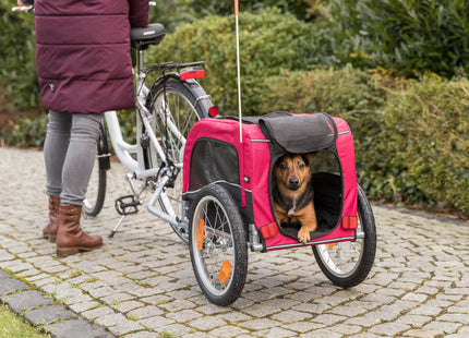 Schwarzer und roter Fahrradanhänger von Trixie für Haustiere