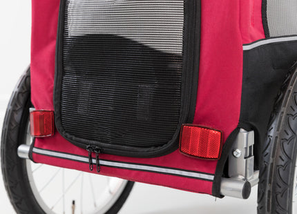 Schwarzer und roter Fahrradanhänger von Trixie für Haustiere