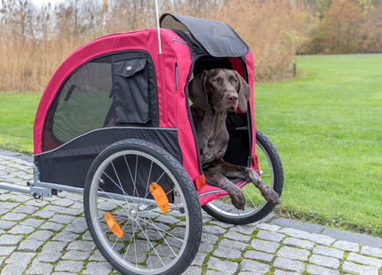 Schwarzer und roter Fahrradanhänger von Trixie für Haustiere